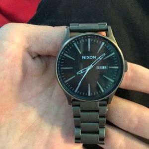 Nixon watch dark blue face